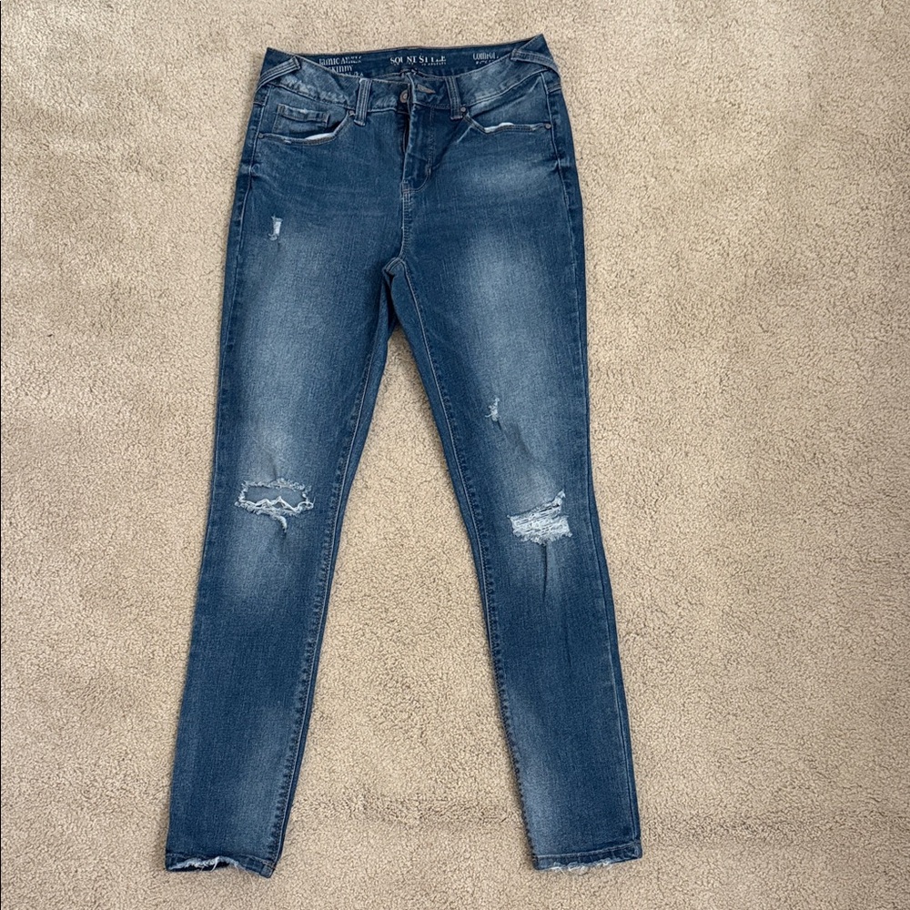 Distressed Blue Jeans